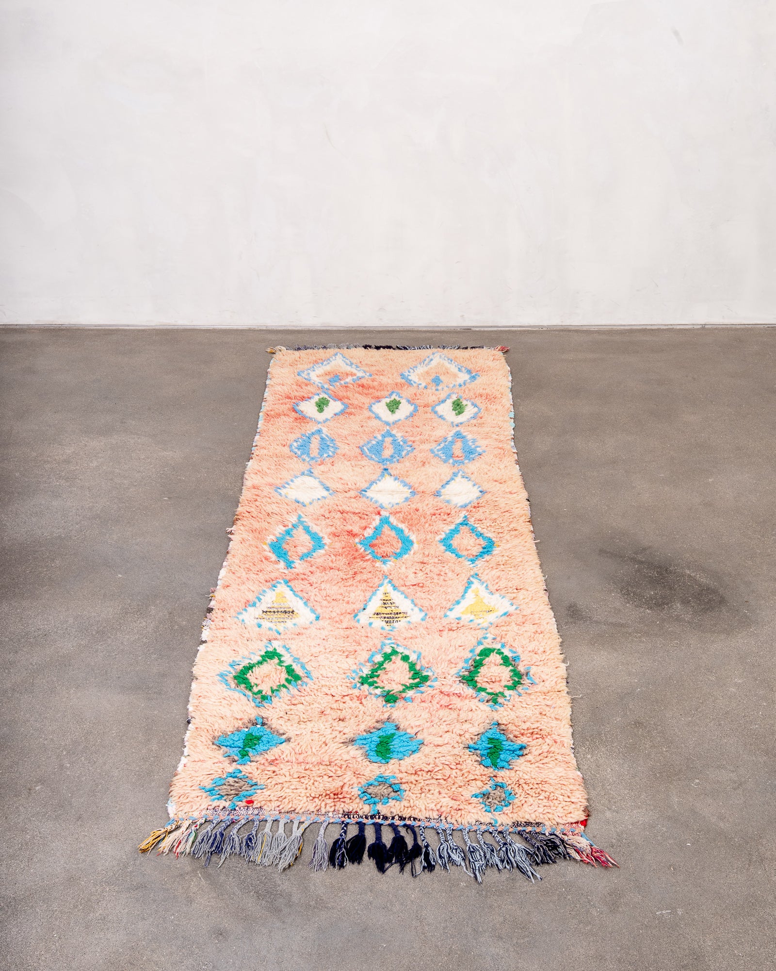 Modern designer handcrafted Berber rug from Morocco. Boujed with beautiful colors and patterns.